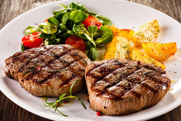 Steak is a dish made from beef originating from the West