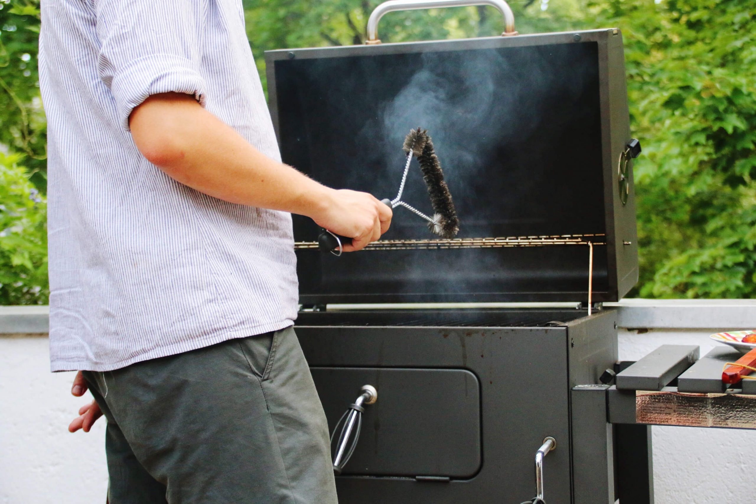 It's easier to remove food residue and greasy accumulations from warm grates